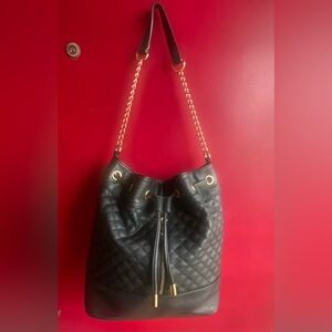 Very stylish shoulder quilted Bucket Bag with tassel tie & magnetic closure